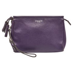 Cartera de mano de piel morada Coach