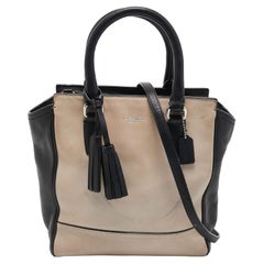 Tote con nappe in pelle nero/beige di Coach