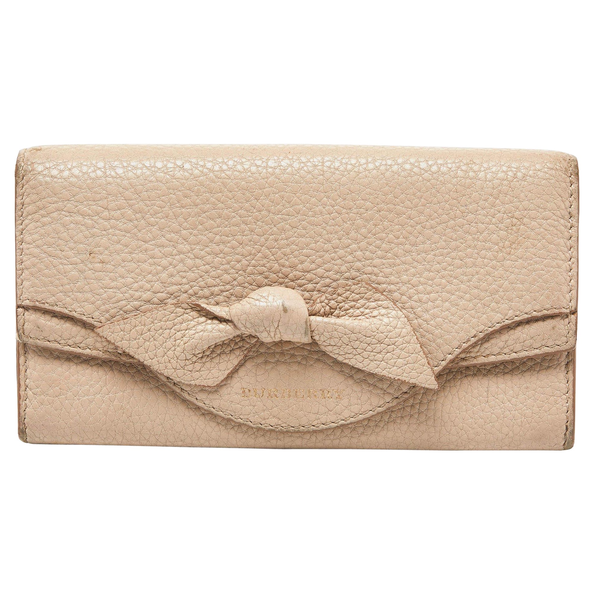 Portafoglio continentale con fiocco in pelle beige di Burberry
