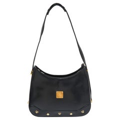Sac à bandoulière en cuir noir avec fermeture éclair MCM
