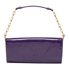 Tory Burch Lila Lackleder-Clutch mit Logo und geprägter Klappe