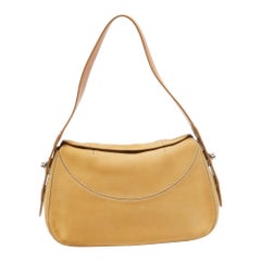 Tod's Tasche mit Drehverschluss aus cremefarbenem/braunem Nubukleder