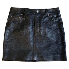 Minifalda Saint Laurent de cuero negro