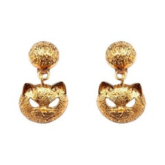 SS20 Moschino Couture Jeremy Scott Pendientes de clip dorados ojo de gato Trick or Chic
