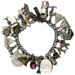 Vintage Sterling Silver Charm Bracelet with 27 Various Charms, Size 7