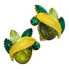Vintage gold tone green glass designer clip on earrings