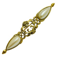 Vintage gold tone faux pearl designer brooch