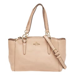 Cartera Coach Mini Christie Carryall de piel de melocotón con doble cremallera
