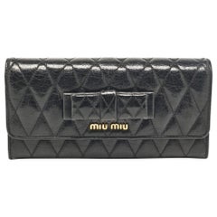 Miu Miu Black Glossy Leather Bow Flap Continental Wallet