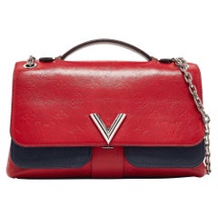 Sac très chaîne Louis Vuitton rouge/bleu monogramme