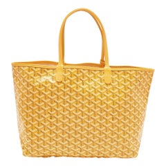 Bolso Goyard PM de piel y lona recubierta de goyardina amarilla Saint Louis