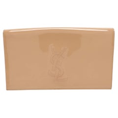 Pochette Belle De Jour in vernice beige di Yves Saint Laurent