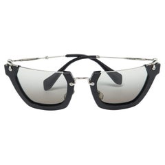 Lunettes de soleil Miu Miu noir/gris dégradé SMU12Q Wink semi-inclinées
