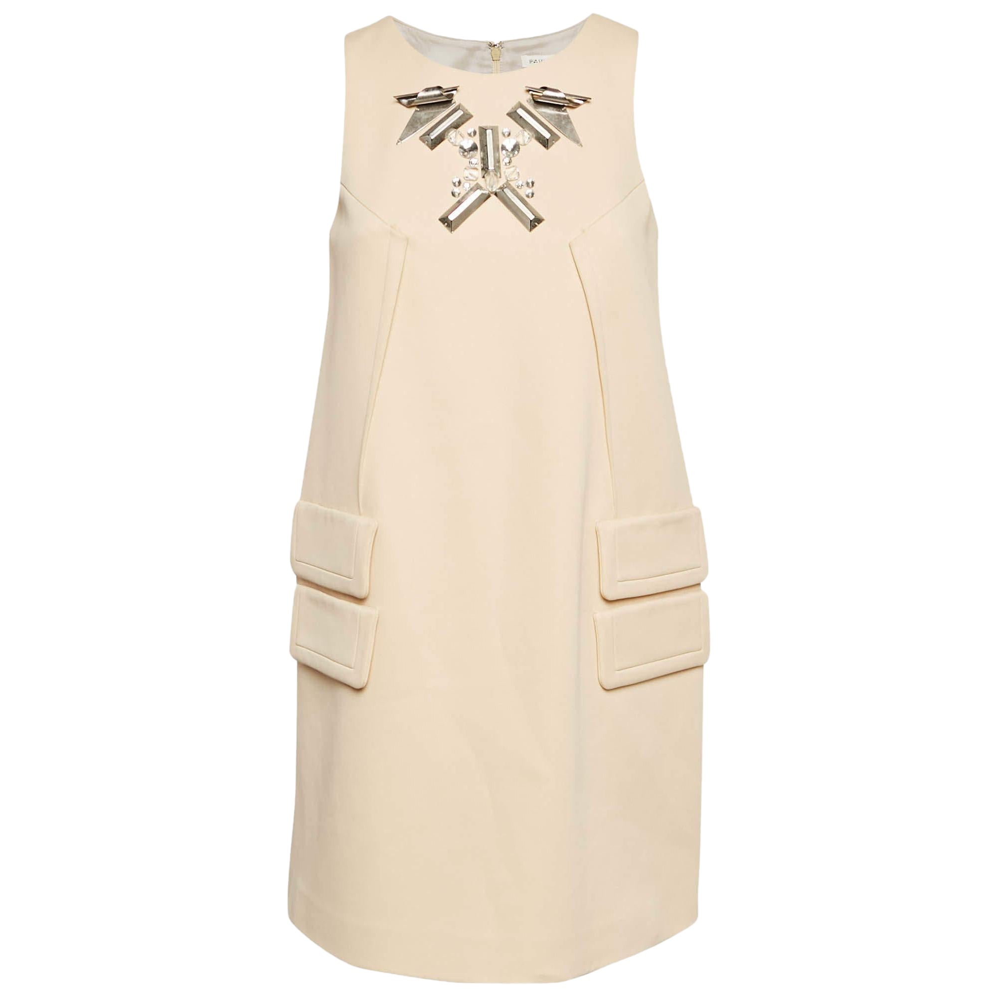 Paule Ka mini-robe droite crème en crêpe extensible ornée de métaux S