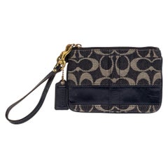 Coach pochette-bracelet signature bleue en toile et cuir verni