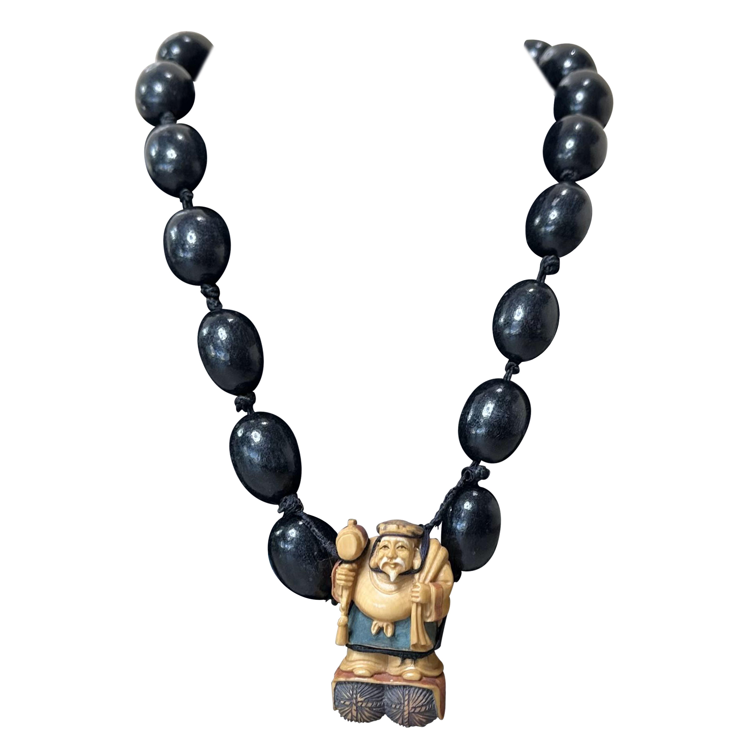 Vintage Carved Asian Male Buddha Rope Necklace For Sale