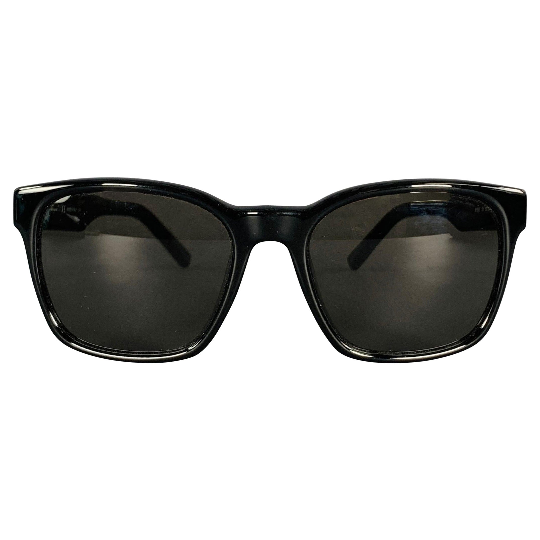 SALVATORE FERRAGAMO Lunettes de soleil en acétate noir en vente