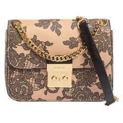 Michael Kors Bolso pequeño Sloan de piel rosa/negro