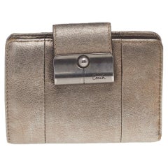 Coach Portefeuille compact en cuir doré métallisé
