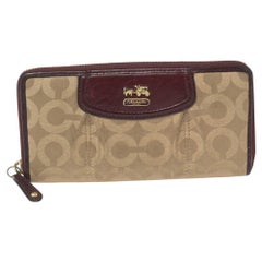 Coach Burgundy/Brown Op Art Fabric and Leather Madison Continental Wallet
