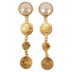 Chanel Long Golden Metal Clip-on Earrings with Pearly Cabochons, 1990s