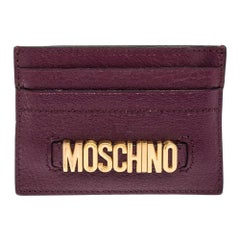Portacarte Moschino in pelle viola con logo
