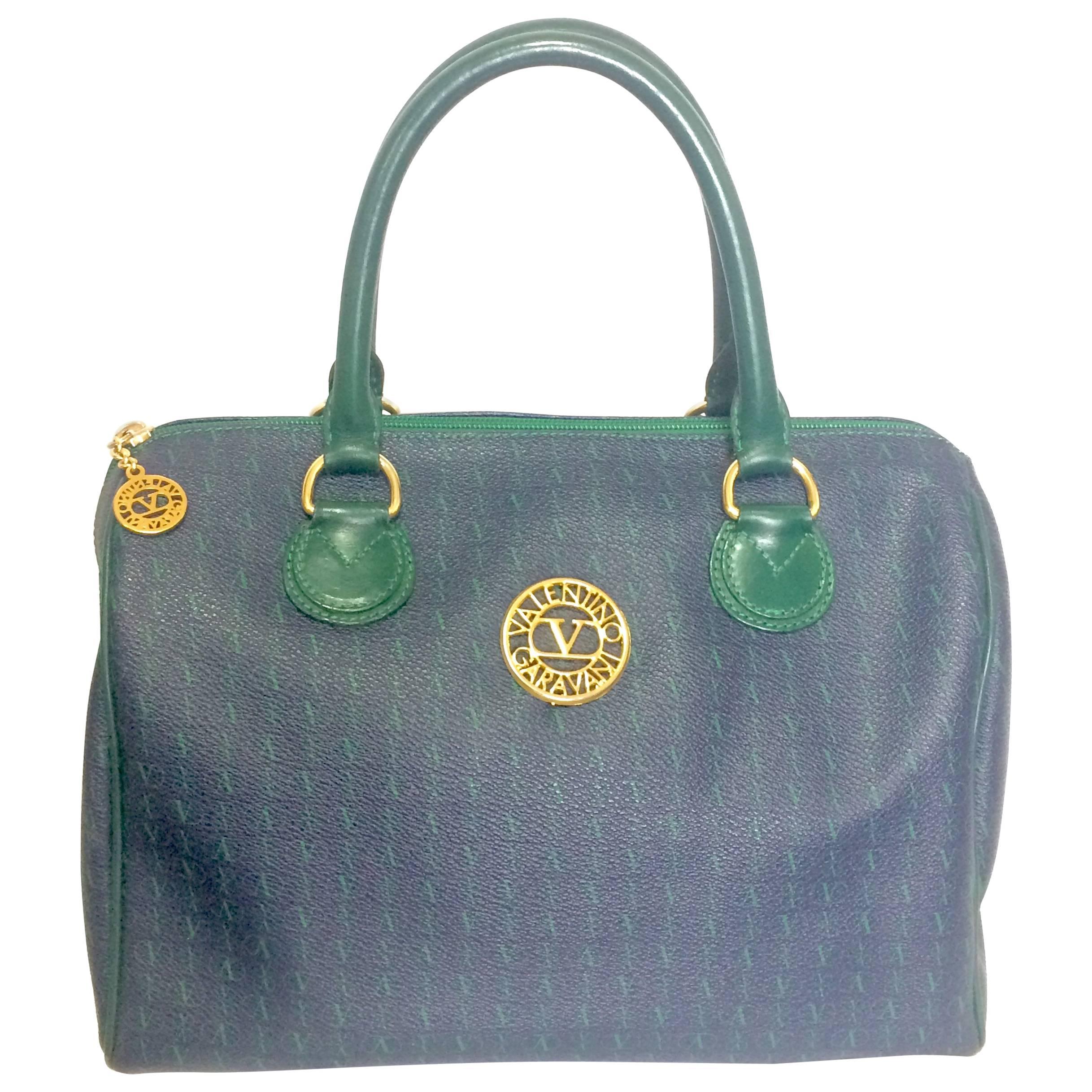 Vintage Valentino Garavani blue and green speedy handbag with logo motifs. For Sale