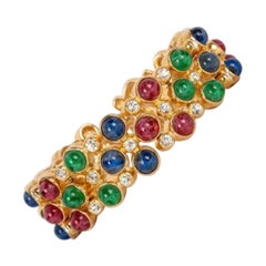 Bracciale in metallo dorato con strass di Christian Dior