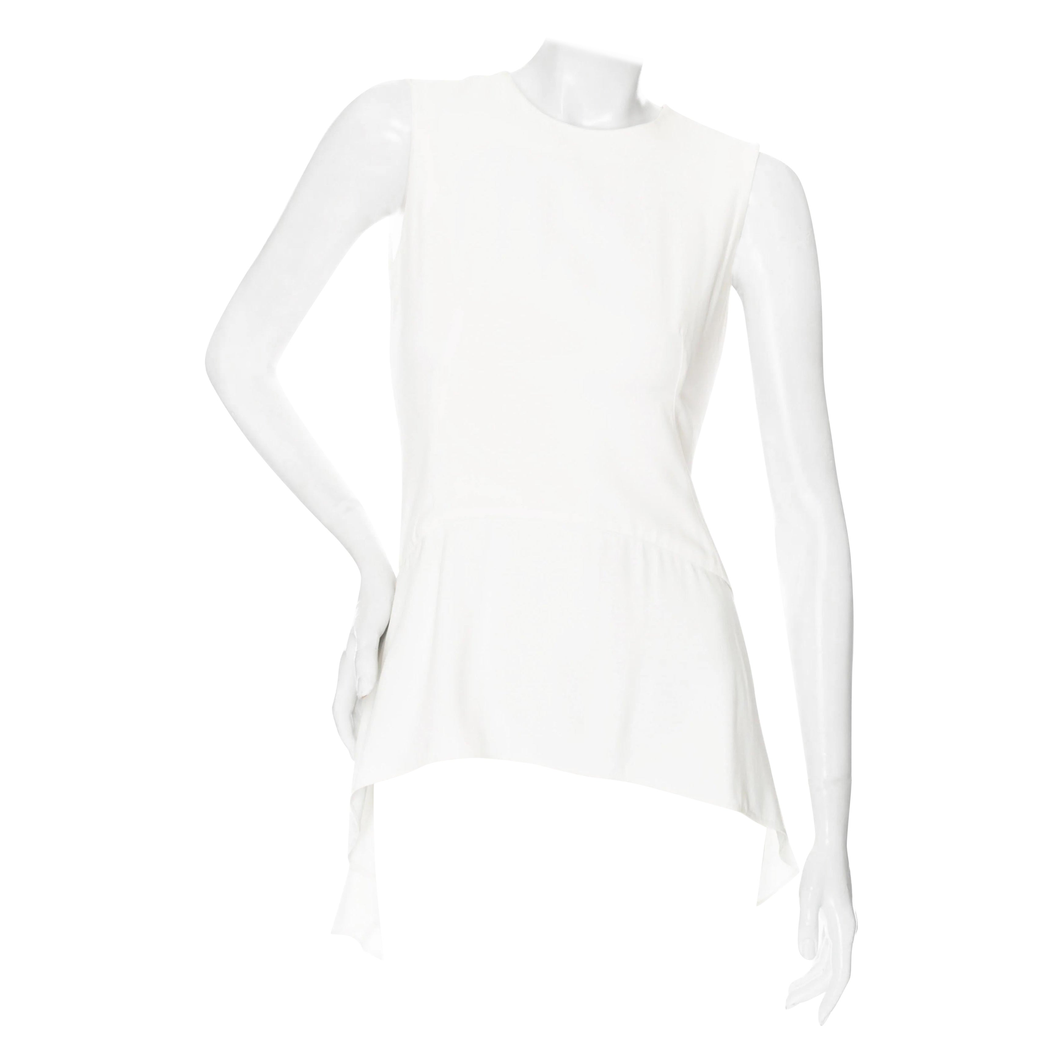 Alexander McQueen, top péplum sans manches à volants, ivoire, 2010