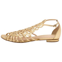 Alexandre Birman Goldfarbene flache Riemchensandalen aus Leder Größe 38