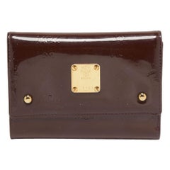 MCM Burgunderrote Visetos geprägte Lackleder Brieftasche mit drei Falten