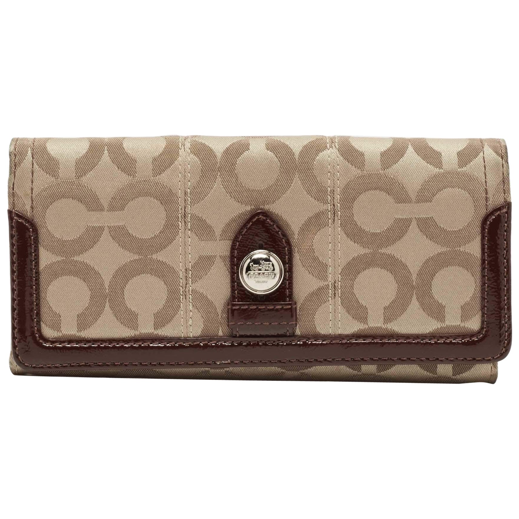 Cartera continental con solapa de Coach en lona y charol beige/marrón de firma