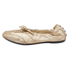 Tod's Baskets à bout pointu en cuir doré, taille 36