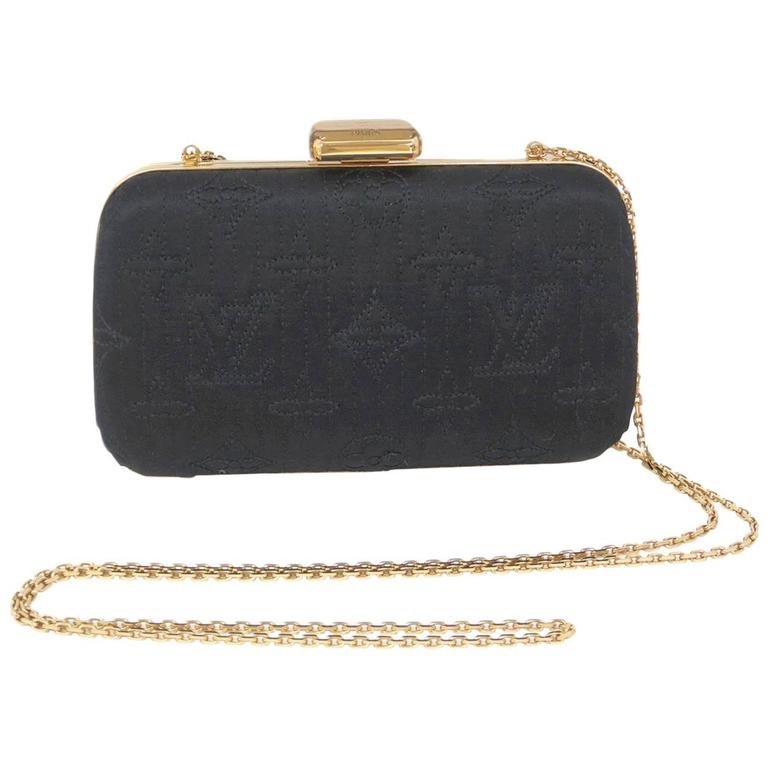 black clutch purse with gold chain