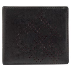 CH Carolina Herrera Schwarzes Leder Perforiertes Logo Bifold Brieftasche