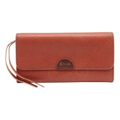 Portefeuille continental à rabat en cuir rouille de Chloe