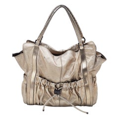 Burberry grand sac porté épaule guerrier en cuir doré