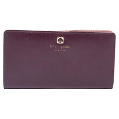 Kate Spade Portafoglio Adel in pelle viola/rosa