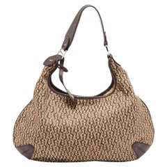 Aigner Hobo de lona y piel beige/marrón con firma