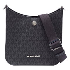 Michael Kors Borsa messenger in tela Coates nera firmata Briley