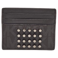 Michael Kors - Portacarte alto in tela rivestita e pelle con borchie - firma nera