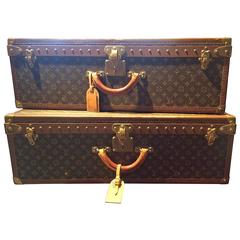 Paire de valises Louis Vuitton Alzer 80 vintage à monogrammes 