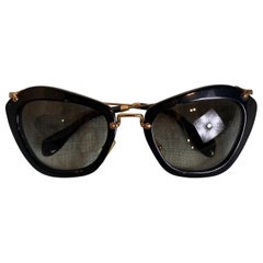 Gafas de sol Miu Miu negras