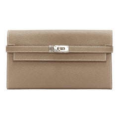 HERMES Kelly Longue taupe togo leather silver turnlock flap long wallet