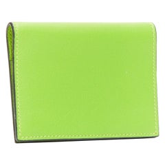 HERMES neon green smooth leather silver hardware bifold cardholder