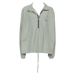 FEAR OF GOD ESSENTIALS jersey caqui de algodón y nailon con logo y media cremallera L