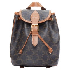 CELINE Folco mini mochila de lona monograma triomphe marrón