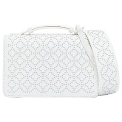 ALAIA Arabesque Franca white silver studded crossbody bag