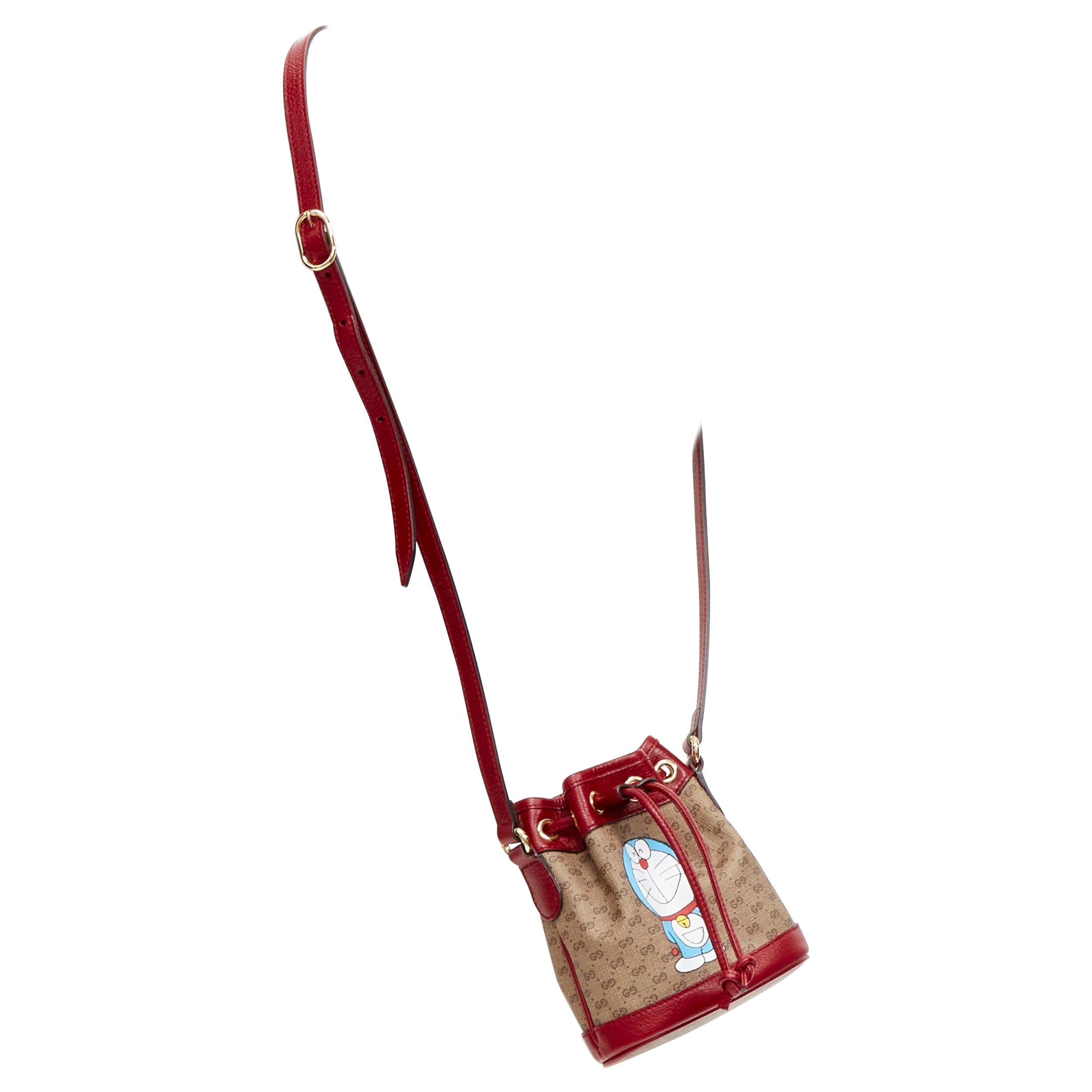 GUCCI DORAEMON 2021 Limited GG Supreme red drawstring crossbody bucket bag For Sale