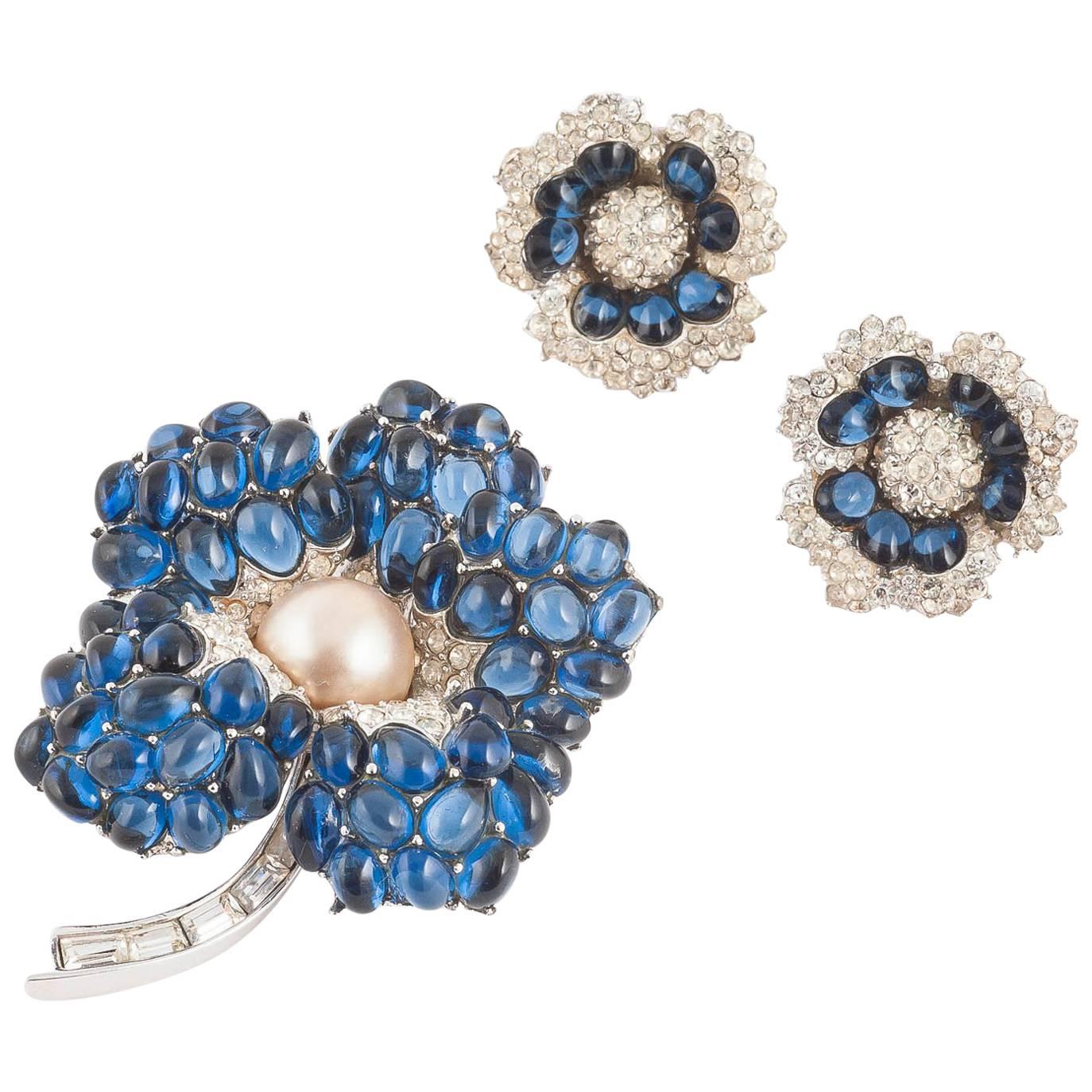 Elegant Marcel Boucher 'flower' brooch and matching earrings.